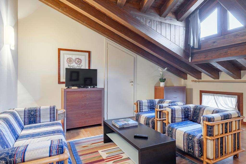 Palazzo Brando - Living Apartments Treviso Pokoj fotografie